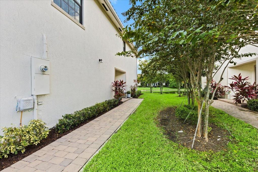 Photo of 6019 Woods Edge Circle, Riviera Beach, FL 33410 (MLS # R11119346)