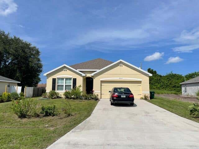 Photo of 2213 SW Monterrey Lane, Port Saint Lucie, FL 34953 (MLS # R10732237)