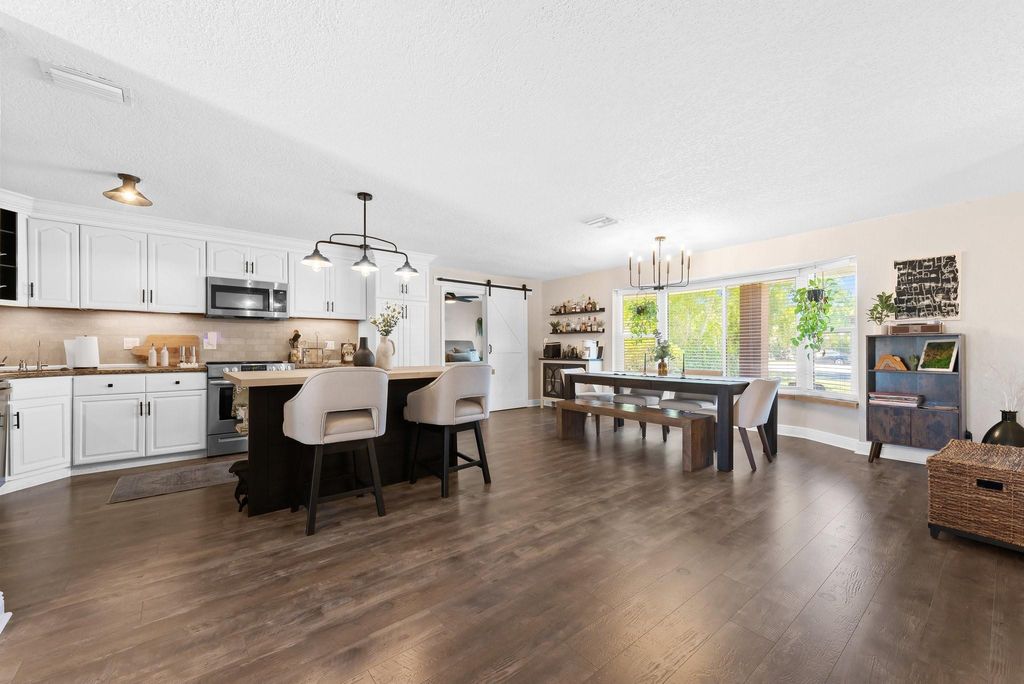 Photo of 10540 NW 37th Court, Coral Springs, FL 33065 (MLS # F10503207)