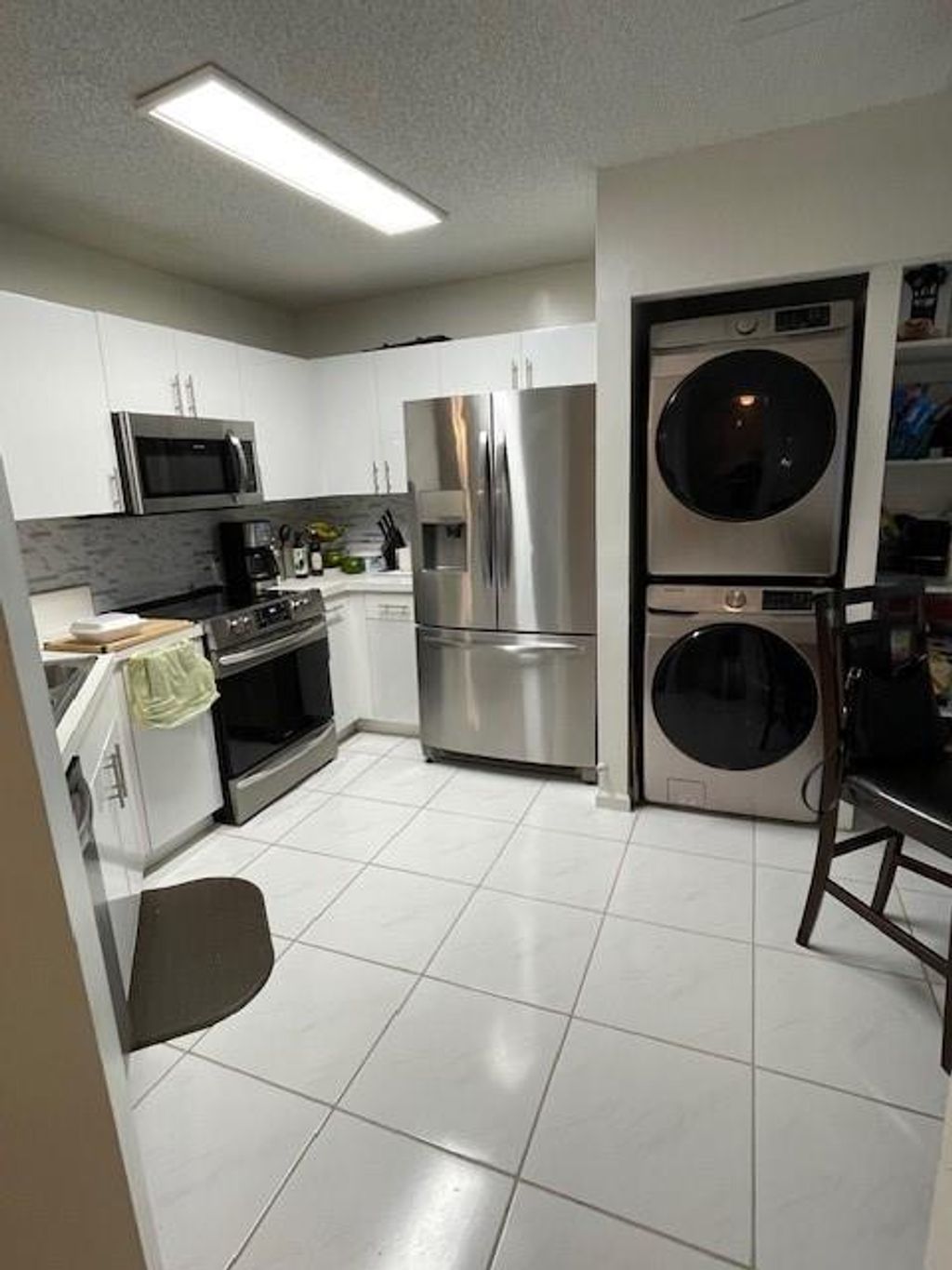 Photo of 1420 SW 47th Ave, Deerfield Beach, FL 33442 (MLS # F10532356)