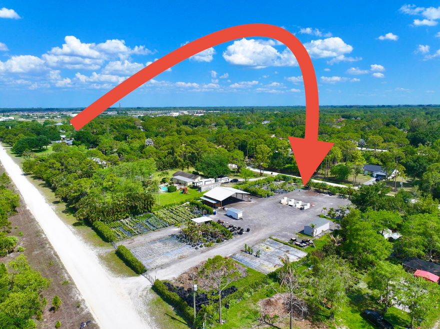 PRIVACY HEDGES ON ALL 4 SIDES  !!!***lot goes street to street  *****GREAT OPPORTUNITY  !!!  2 POLE BARNS- 36' X36' &  12'X10' !! ELECTRIC RUN FOR ICE MACHINE !!!    FULLY FENCED !!ELECTRIC !! WELL AND PUMP !!  ABOVE GROUND AND IN-GROUND IRRIGATION !! 2 GATED ENTRANCES !!!     Excellent Opportunity !!!  Landscapers !!!  Great Potential Opportunity  for Anyone  !!!!   2.07 acres !!!!!!  Pole Barn !!   Fully fenced !!!!   well  !!! Street to Street. !!!!   BUILD YOUR DREAM HOME ON THIS 2.07  ACRES LOT *** NO HOA **. ALL NICE WELL KEPT HOME ON STREET**. LOT  goes STREET TO STREET !!!!  **. MINUTES WALKING TO PUBLIX, LIBRARY , BANK, ***. !!! GREAT POSSIBLITIES ***NO HOA****BUILD YOUR DREAM HOME ON THIS NICE LOT- READY - EXCELLENT OPPORTUNITY TO OWN A 2.07 ACRES LOT IN LOXAHATCHEE WITH NO HOA !!! MINUTES TO SHOPPING, SCHOOLS, WESTLAKE ER , BEACHES , GAS , & BANKS !!!! ALL NICE HOMES ON STREET !! THE POSSIBILITIES ARE ENDLESS**. SCHEDULE YOUR PRIVATE SHOWING TODAY!!! build your dream home on this prime lot *** *** no hoa- bring your rv, boat, trailer and horses **