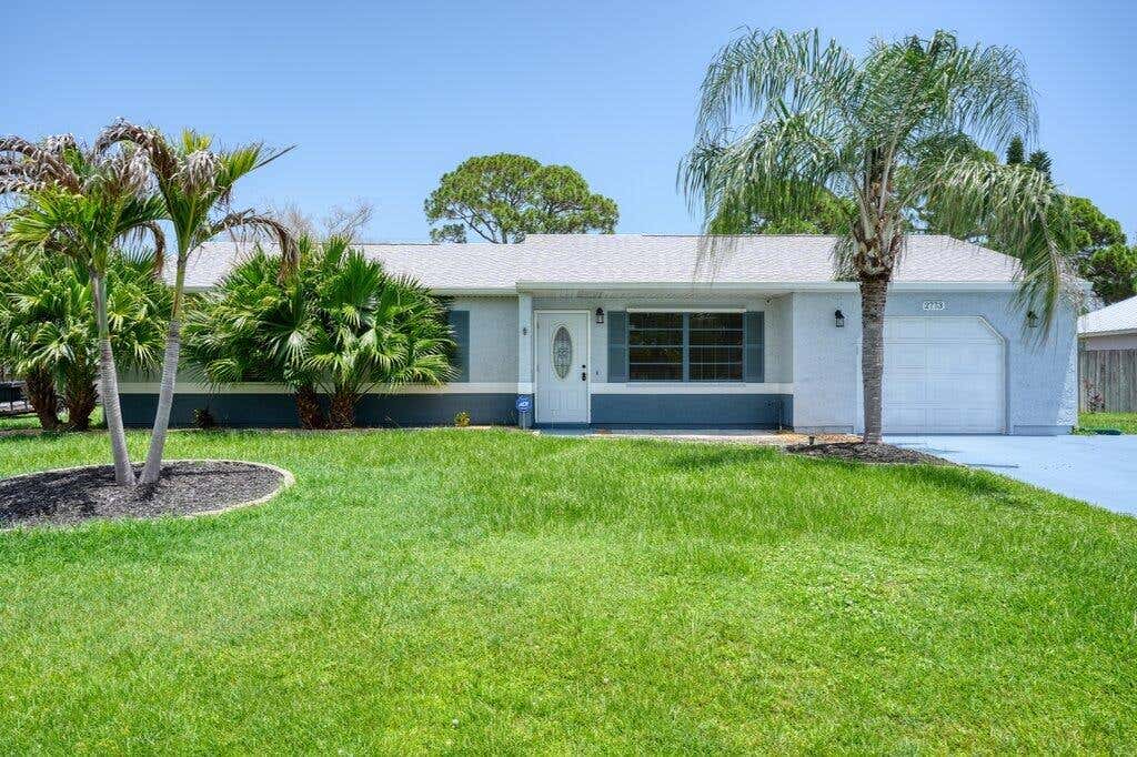 Photo of 2773 SE Brevard Avenue, Port Saint Lucie, FL 34952 (MLS # B26052792)