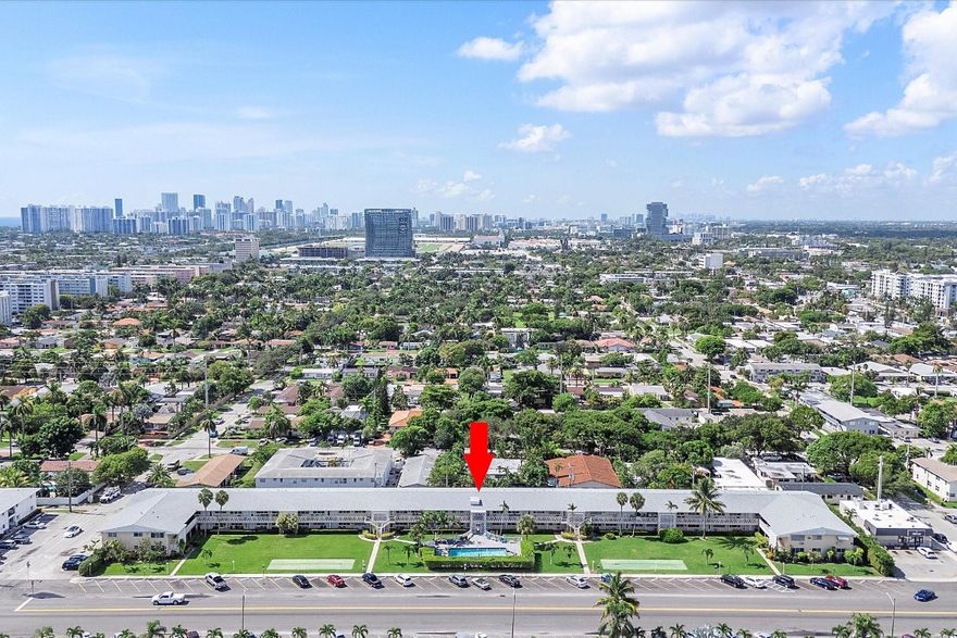 55+ active community east of A1A, offers a vibrant lifestyle. Perfect for the outdoor Florida lifestyle, the home features original rustic hardwood flooring, rustic-modern design, new kitchen backsplash and hardware, updated shower, baseboards, 3D wall accents, zebra blinds, and new impact windows/doors, and a community pool located close to the unit. BRAND NEW ROOF for the building in 2025. Enjoy winters in the Florida sunshine! Move-in ready. Low HOA fees. No leasing but you are allowed family and friends to stay for up to 8 weeks per year. Close to world-famous beaches, casino, I-95, Starbucks, shopping, and Gulfstream Park for dining, luxury shopping, and horse racing. CO-OP Owns the Land, there is NO LAND LEASE!  Cash only.