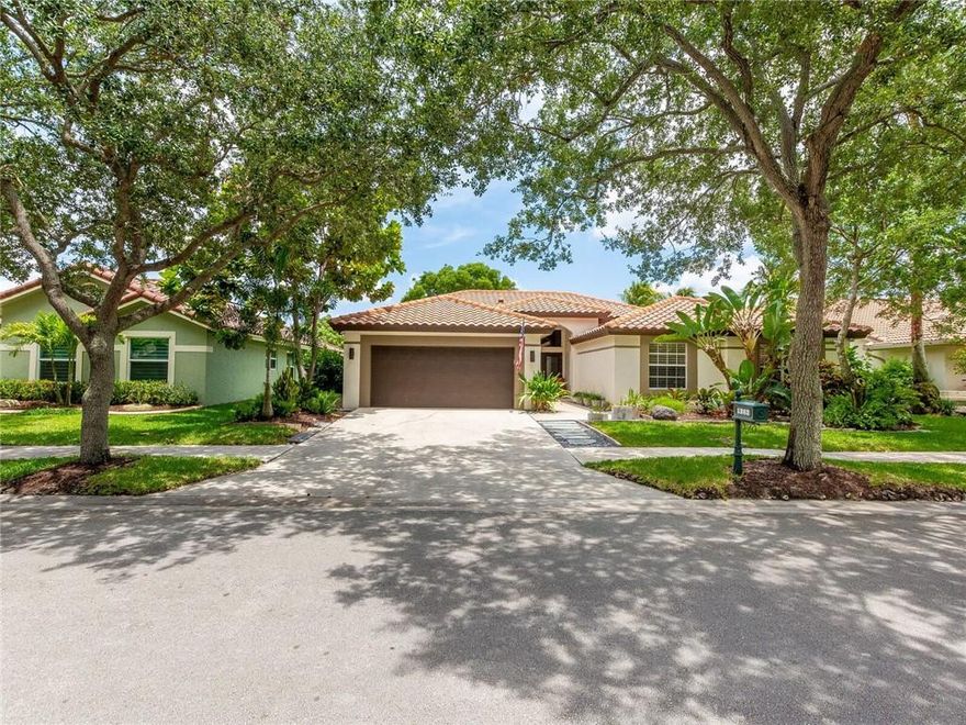 PRIDE OF OWNERSHIP IS APPARENT THRU OUT!!METICULOUS AND BRIGHT CUSTOM HOME ON QUIET CUL DE SAC STREET , MANICURED ENTRY LANDSCAPE AND CURB APPEAL, HOME  FEATURES VAULTED CEILINGS, ITALIAN PORCELAIN FLOORING, CUSTOM DESIGNED KITCHEN WITH GRANITE AND STAINLESS APPLICANCES, BATHROOMS TASTEFULLY UPDATED AND DESIGNED, EXTENDED COVERED PATIO OVERLOOKING LUSH TROPICAL LANDSCAPE AND EXTENSIVE VIEWS OF THE LAKE, HURRICANE PROTECTION SCREENING, ROOF WITHIN 14 YEARS WITH (2) 3 TON AIRCONDITIONERS LESS THAN 10YRS, GARAGE DOOR WINDMITIGATED GRADED, FRONT DOOR IMPACT, ALL CLOSETS CUSTOM SHELVING, A MUST SEE TO APPRECIATE!!! OWNER RELOCATING AND WILL ENTERTAIN ALL OFFERS.