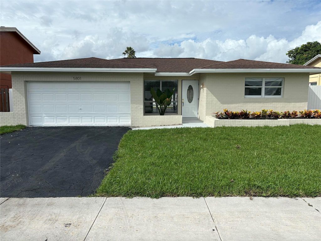 Photo of 5801 W Commerical Boulevard, Tamarac, FL 33319 (MLS # F10527557)
