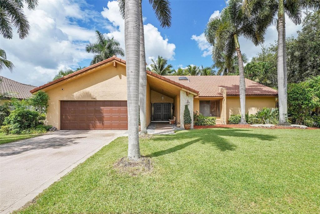 Photo of 1581 NW 100th Way, Plantation, FL 33322 (MLS # F10548277)