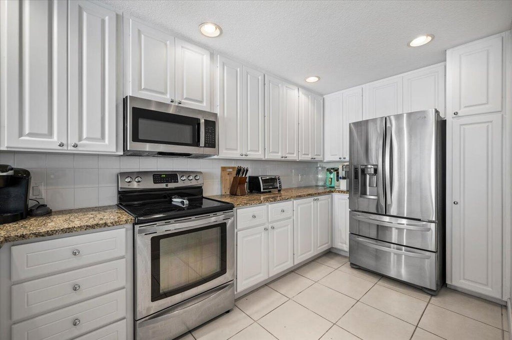 Photo of 178 Soriano Drive, Jupiter, FL 33458 (MLS # R10950352)