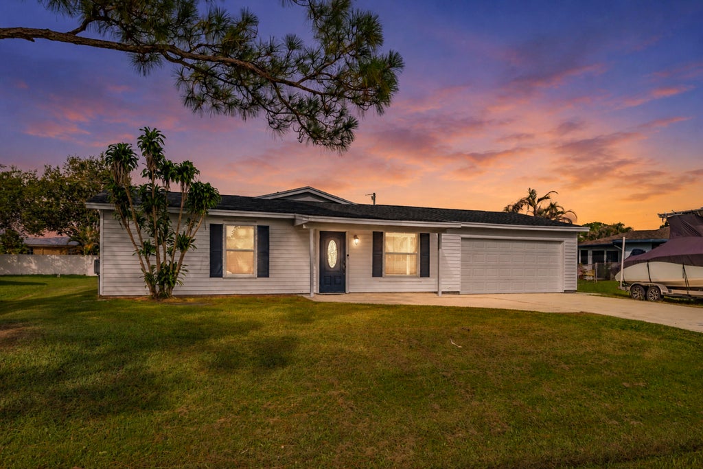 Photo of 1810 SW GEMINI Lane, Port Saint Lucie, FL 34984 (MLS # B26061737)