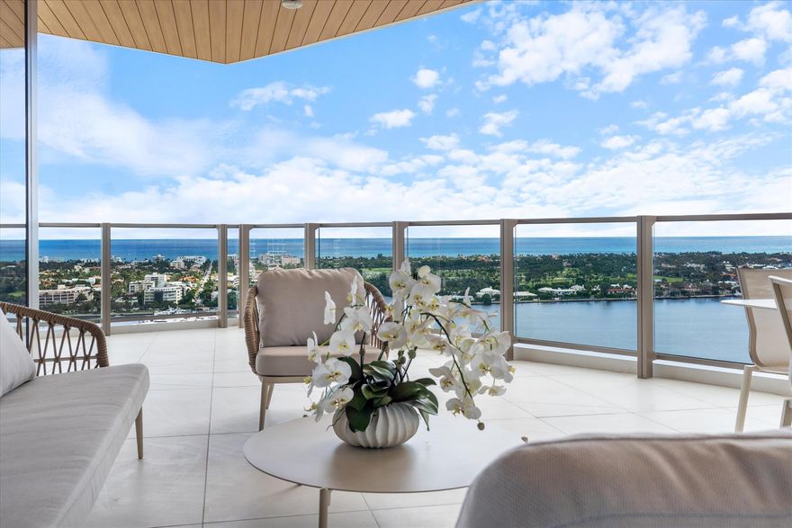 BRAND NEW WATERFRONT! The ONLY residence in the building to have TWO separate full baths each finished with Taj Mahal stone in the primary bedroom. Experience sweeping views of Palm Beach, the Intracoastal, and the Atlantic Ocean from Residence 2002 at Forte on Flagler. This NEW custom flow-through residence offers 4,440 sq ft of refined living with floor-to-ceiling windows and an expansive wrap-around terrace that creates seamless indoor-outdoor living. The spacious main living area features an open floor plan and a custom wet bar; an elegant focal point designed for effortless entertaining. The gourmet kitchen showcases premium appliances, a sculptural island, and custom cabinetry. Three additional en-suite bedrooms provide comfort and flexibility for guests, work, or wellness. Forte on