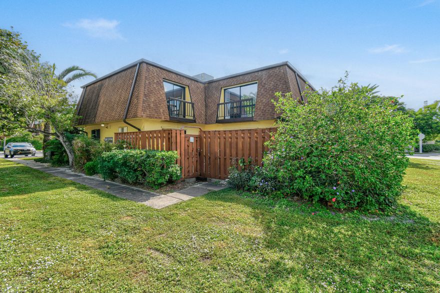 Welcome to your breezy coastal hideaway, where waterfront living meets everyday comfort. Set along a serene canal with quick access to the Intracoastal, this home is perfect for enjoying the Florida lifestyle. Relax on the expansive private screened-in patio, ideal for entertaining or unwinding after a day on the water. Inside features 2 spacious ensuite bedrooms, a convenient first-floor half bath, and an eat-in kitchen that flows into a bright, airy living space filled with natural light. Updates include renovated bathrooms, full storm protection, and a 2024 roof. Additional highlights include 2 assigned parking spaces, community pool, and pet-friendly policies (with restrictions).