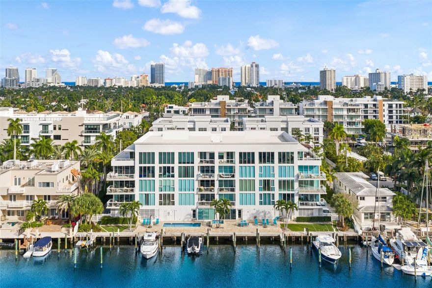 Experience the Las Olas lifestyle with the ease of condo living and the convenience of an on-site marina. This 4th-floor furnished residence offers breathtaking views of downtown Fort Lauderdale paired w/ tranquil water vistas. Enjoy dazzling city lights at night & serene, sunlit spaces by day through floor-to-ceiling windows. Highlights include an expansive balcony, generous his-and-hers closets, a dedicated laundry room, and resort-style amenities including a gym, pool, and jacuzzi. This impeccably maintained boutique building includes a semi-private elevator with foyer entry, secure gated garage parking, and EV-charging capability.