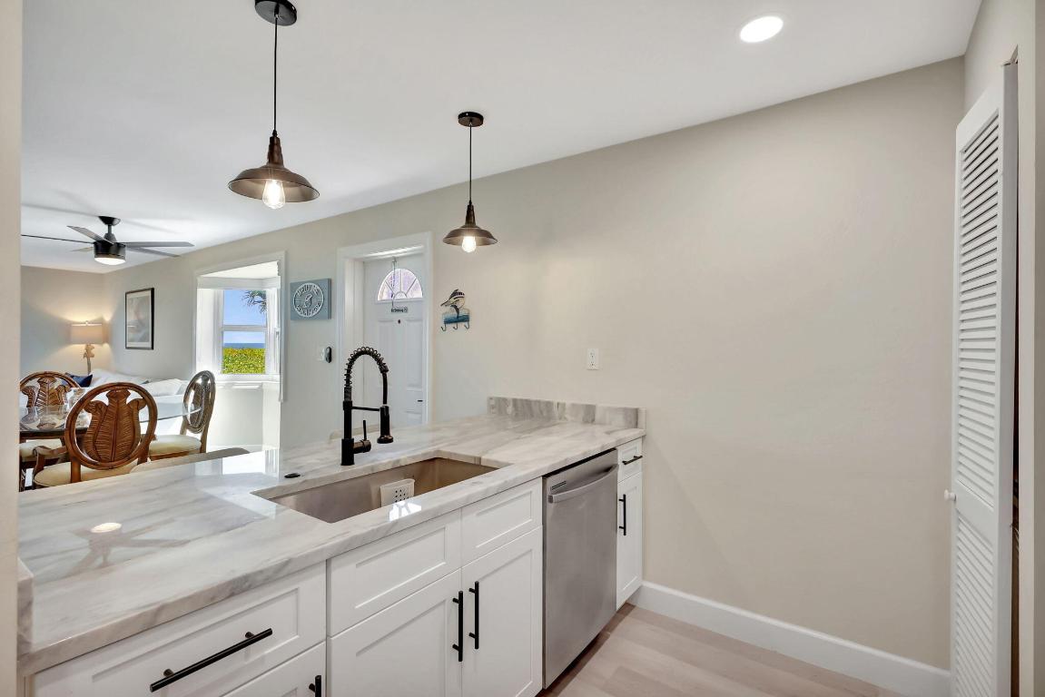 BEACH VILLAS ON HUTCHINSON ISLAND CONDOMINIUM - Residential