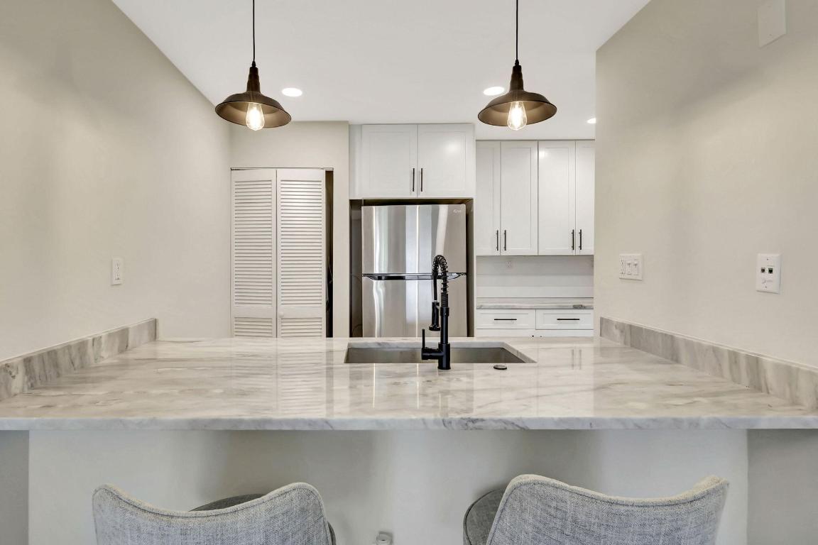 BEACH VILLAS ON HUTCHINSON ISLAND CONDOMINIUM - Residential