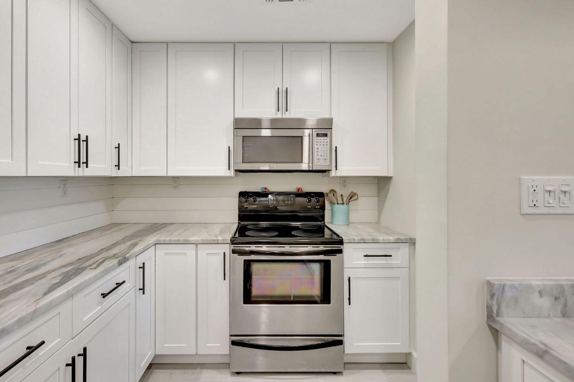 BEACH VILLAS ON HUTCHINSON ISLAND CONDOMINIUM - Residential