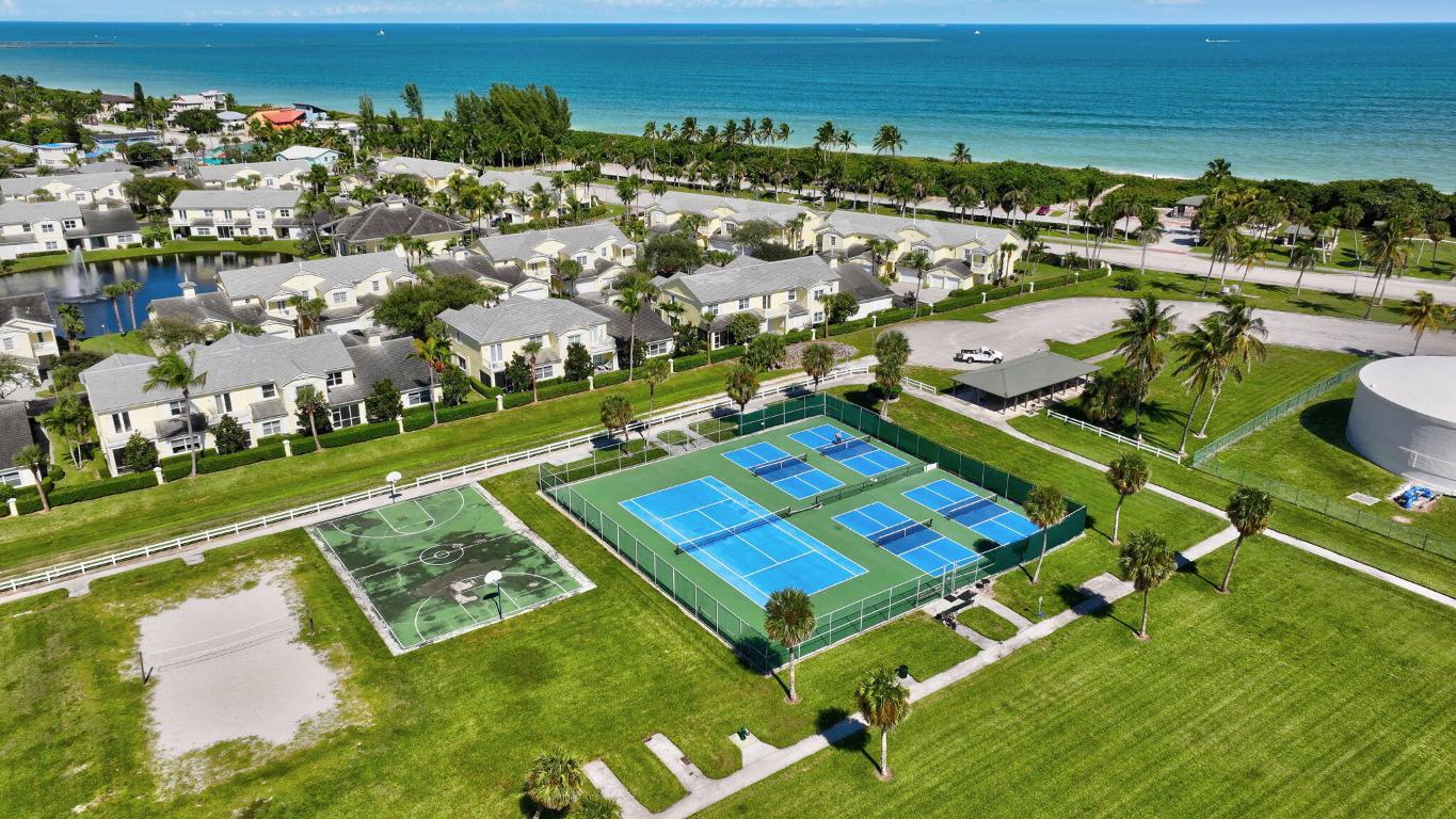 BEACH VILLAS ON HUTCHINSON ISLAND CONDOMINIUM - Residential