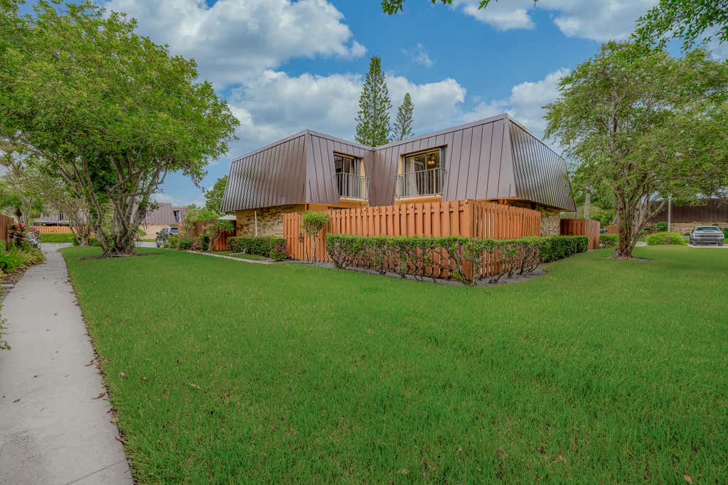 Photo of 6455 SE Windsong Lane #105, Stuart, FL 34997 (MLS # B26060857)