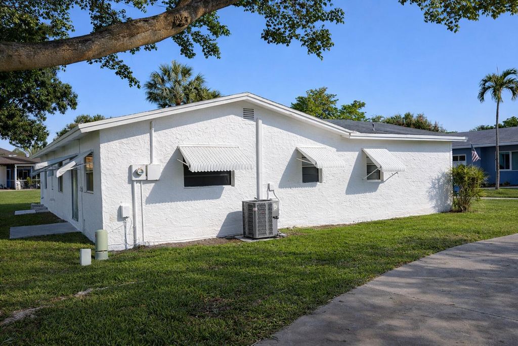 Photo of 2613 SW Natura Avenue, Deerfield Beach, FL 33441 (MLS # B26006499)