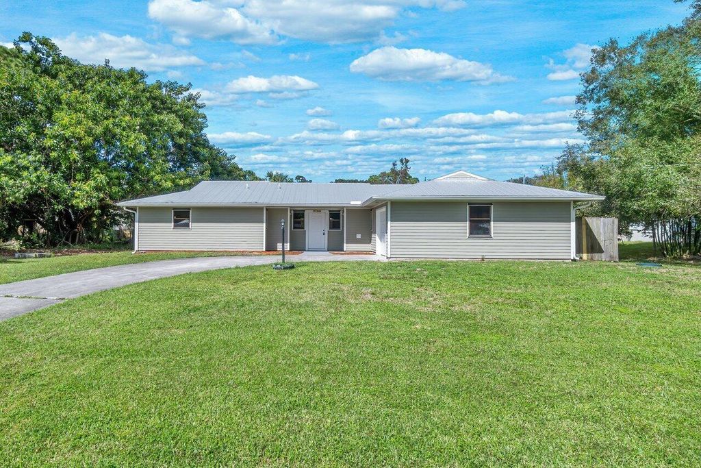 Photo of 7106 Pensacola Road, Fort Pierce, FL 34951 (MLS # R10931186)