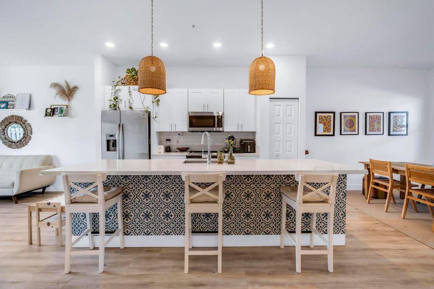 Best Value in Apex Doral! Resort-Style Living and First-Floor Convenience - Experience the perfect blend of modern sophistication in this impeccably maintained 2-bedroom, 2-bathroom condo. The open-concept layout flows seamlessly to a private back patio. Nestled within a premier gated community, you're not just buying a home; you're gaining a lifestyle. Enjoy unmatched resort-style amenities: a grand clubhouse, game room, multiple pools and splash pad, a state-of-the-art fitness center, tennis and basketball courts, and several playgrounds. Pet friendly community. Walking distance from Andrea Castillo Elementary! Call Jennifer for gate access.