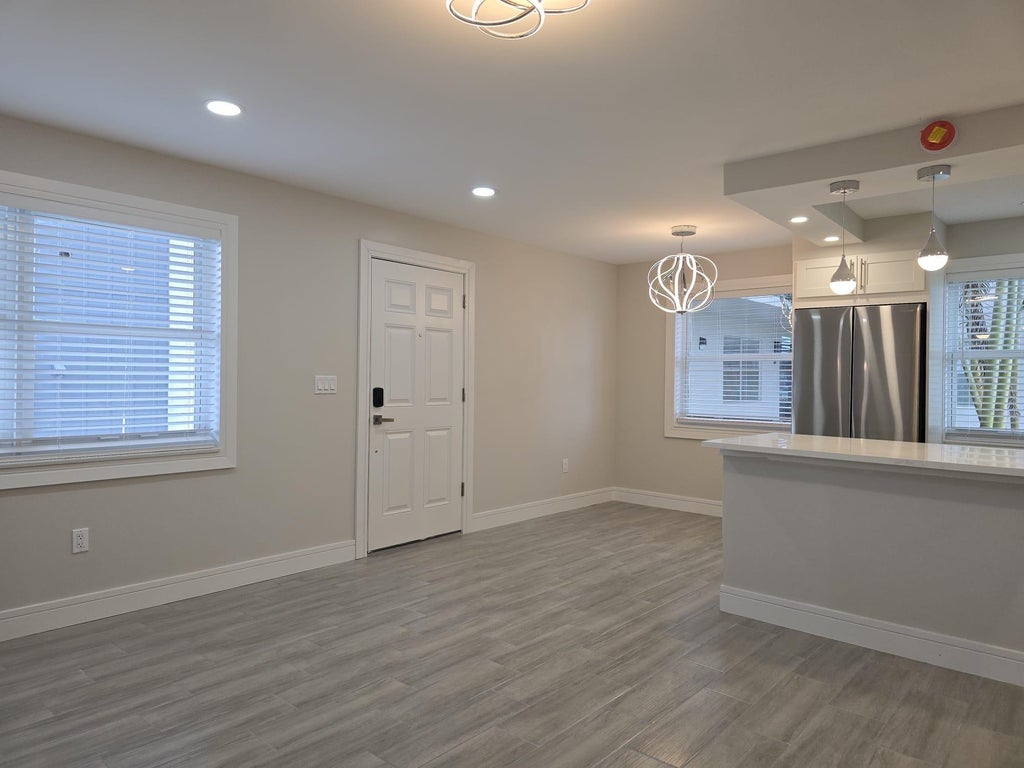 Photo of 215 E NORMANDY E #215, Delray Beach, FL 33484 (MLS # B26067063)