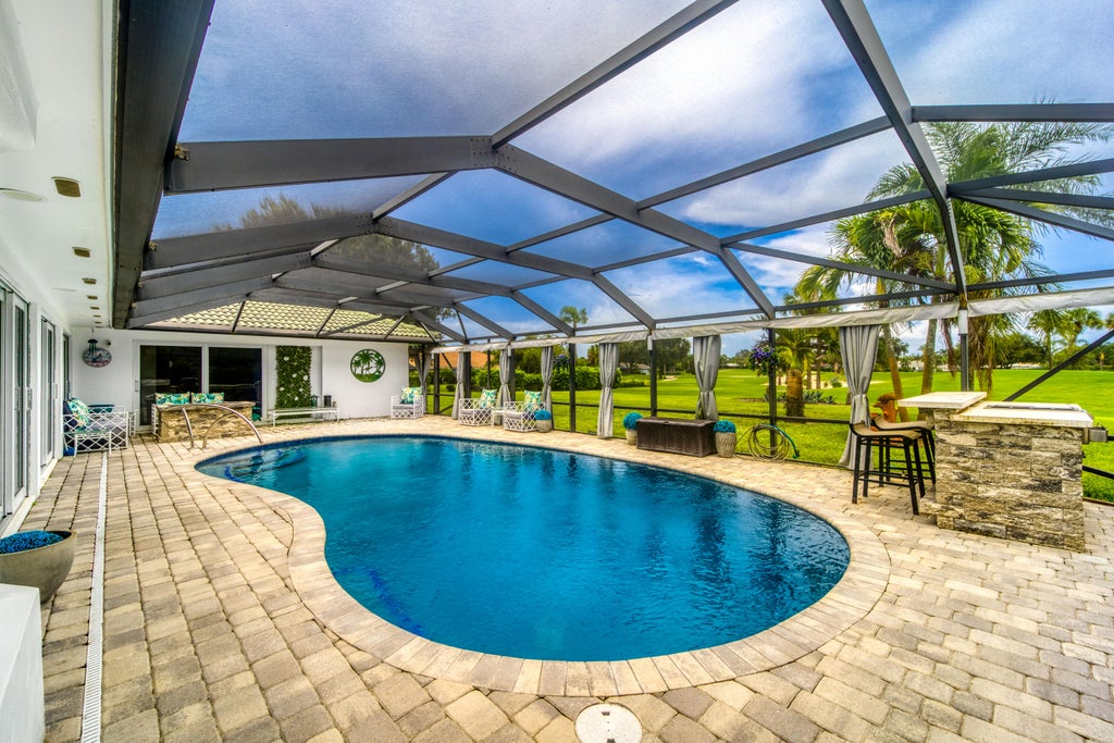 Photo of 3273 SE FAIRWAY E, Stuart, FL 34997 (MLS # B26060170)