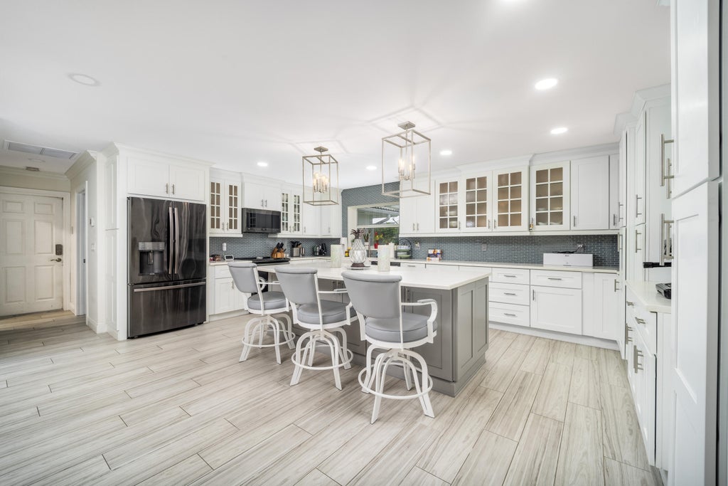 Photo of 3273 SE FAIRWAY E, Stuart, FL 34997 (MLS # B26060170)