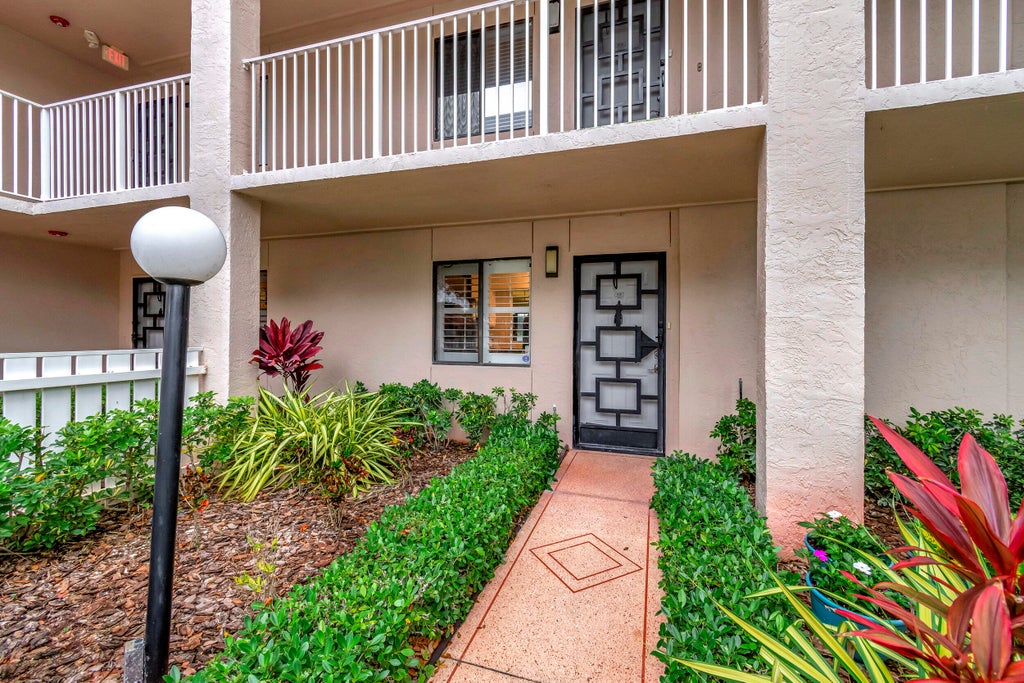 Photo of 6269 Pointe Regal Circle #102, Delray Beach, FL 33484 (MLS # R10948611)