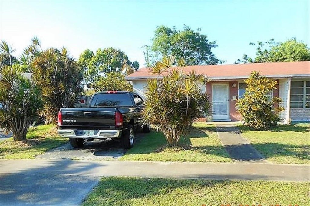 Photo of 3865 NW 42ND Court, Lauderdale Lakes, FL 33309 (MLS # B26090227)