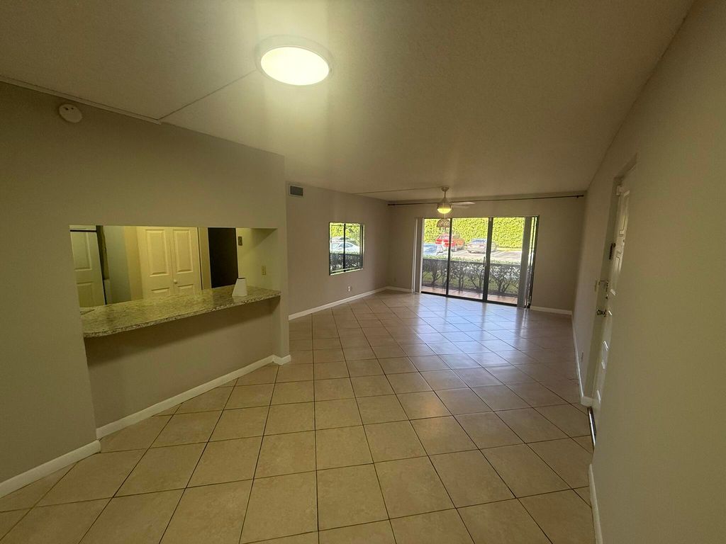 Photo of 617 Sea Pine Way #B1, Greenacres, FL 33415 (MLS # R11169259)