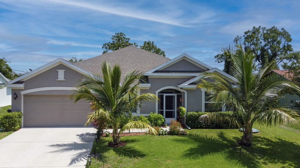 Photo of 443 SW Dahled Avenue, Port Saint Lucie, FL 34953 (MLS # R10992632)