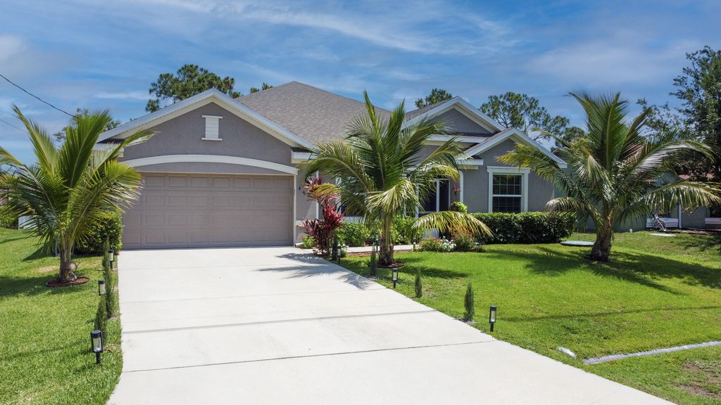 Photo of 443 SW Dahled Avenue, Port Saint Lucie, FL 34953 (MLS # R10992632)