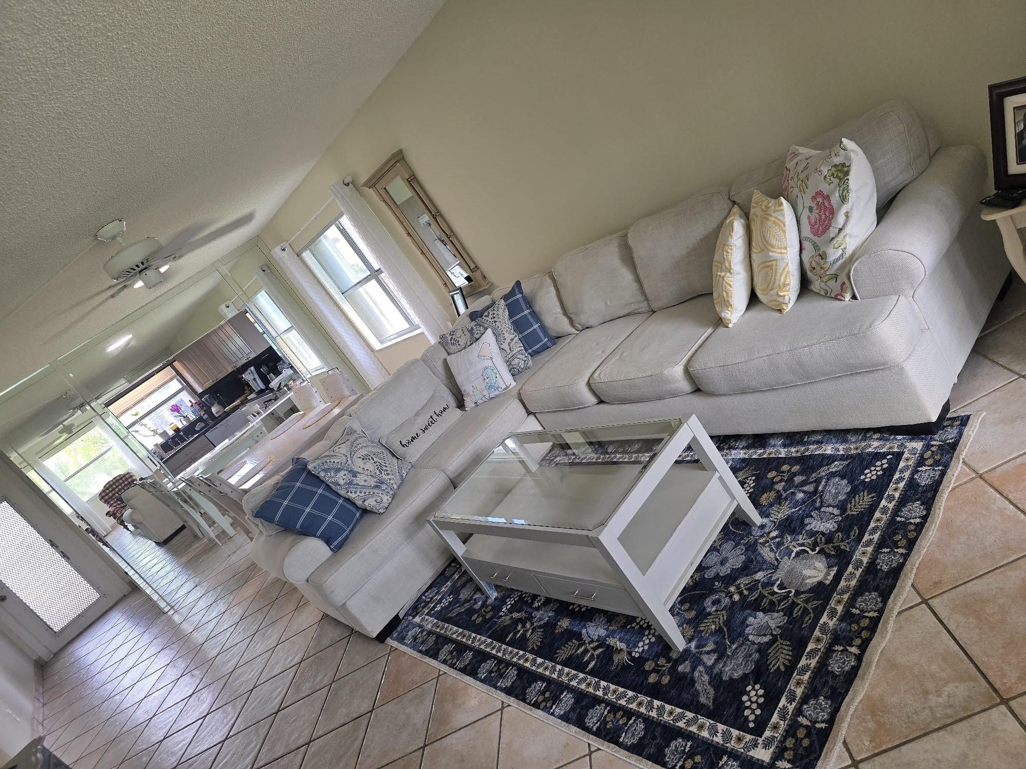 Beautiful 2br/2bath corner unit condo in sunrise lakes phase 3 with over 1100sqft of living space with a Florida room that can be used as an office/den. This unit is ready to move in with new kitchen appliances, wood kitchen cabinets, eat in kitchen, pull out cabinet drawers, tile floors, accordion shutters all around -and has a nice open floor plan with amazing vies of the lake and golf from the property. Community is 55 plus with a beautiful clubhouse, tennis, courtesy bus, billiards, indoor heated pool, 5 satellite pools throughout the community, fitness room and more. A storage unit on the same floor. his location is close to shopping and sawgrass mills mall. The Property will be sold if needed with the Living room and dining room.