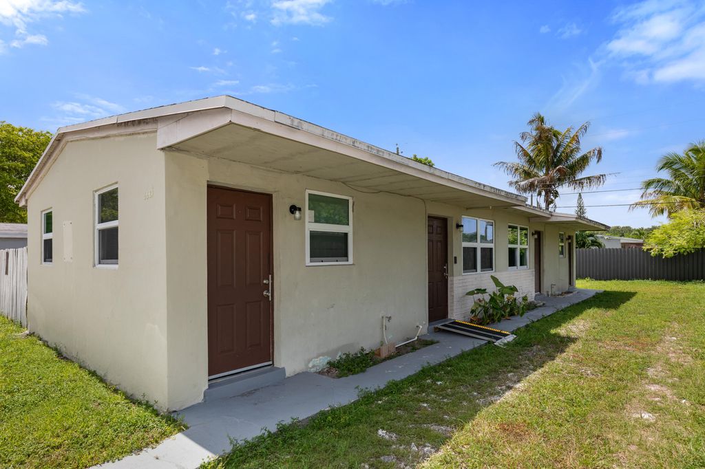 Photo of 5521 SW 34th Street #1-2, Hollywood, FL 33023 (MLS # B26046491)
