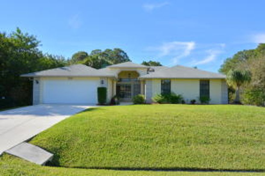 Privacy Galore! This home is bordered by a canal, a wooded lot and the backyard rolls into Oak Hammond Park. This home features 3 bedrooms, 2 baths and plenty of living space which includes a breakfast nook, dining area, living room and family room with plenty of windows to enjoy the view.The master suite features an updated bath and a large closet with built-ins. This pool home with new AC, fence and Kinetico water filtration system wont last long!