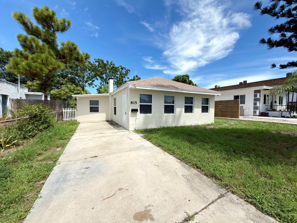 Photo of 815 BAYBERRY Drive, Lake Park, FL 33403 (MLS # B26075722)