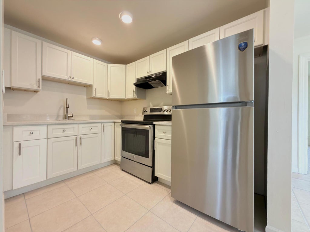 Photo of 815 BAYBERRY Drive, Lake Park, FL 33403 (MLS # B26075722)