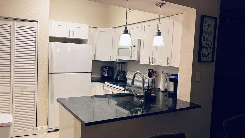 Photo of 621 Cypress Lake Boulevard #A16, Deerfield Beach, FL 33064 (MLS # R11092467)