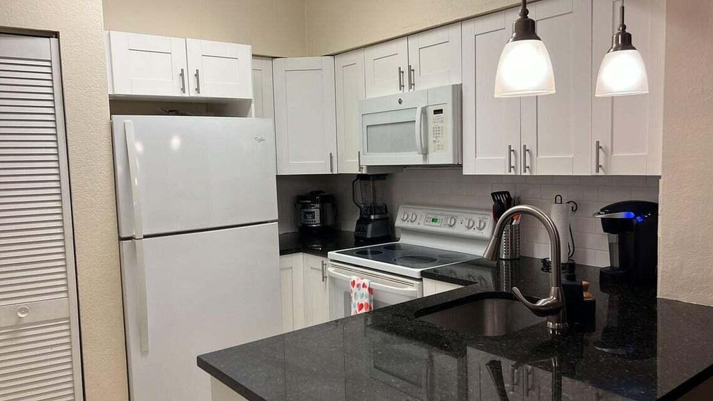 Photo of 621 Cypress Lake Boulevard #A16, Deerfield Beach, FL 33064 (MLS # R11092467)