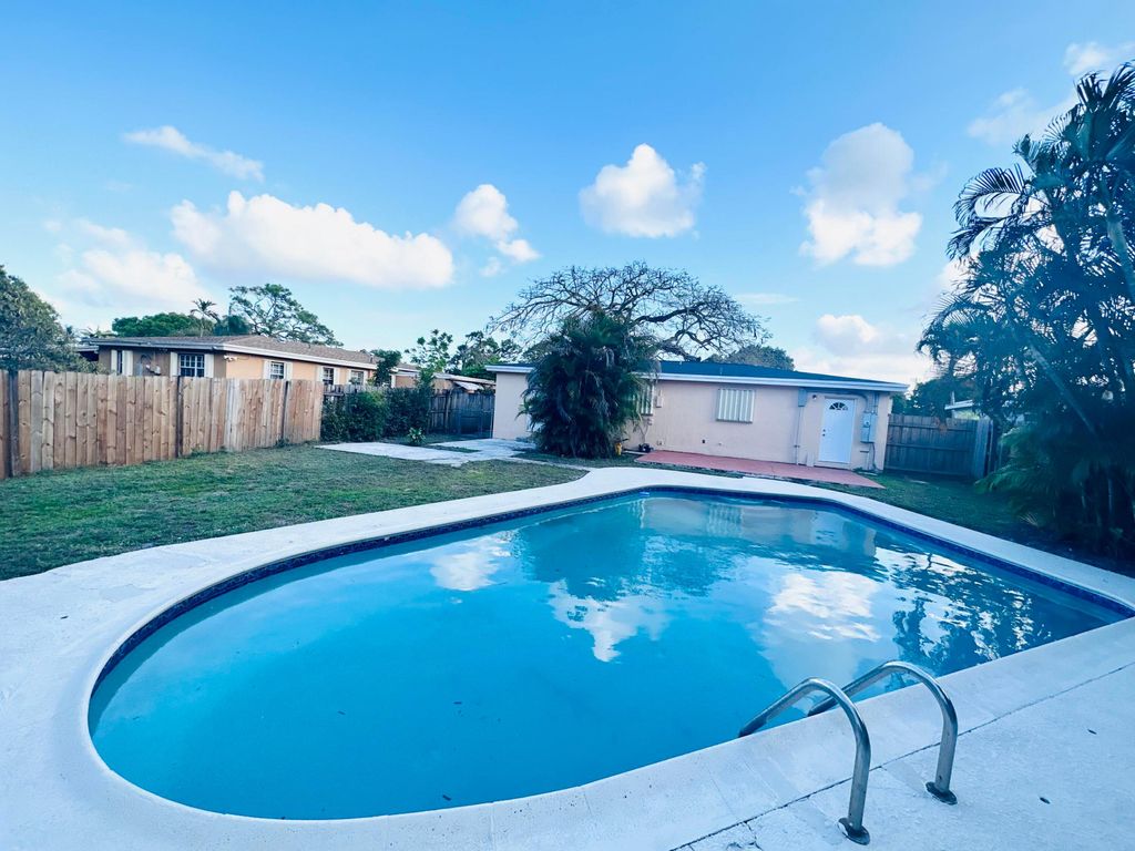 Photo of 2849 SW 8th Street, Fort Lauderdale, FL 33312 (MLS # B26010968)