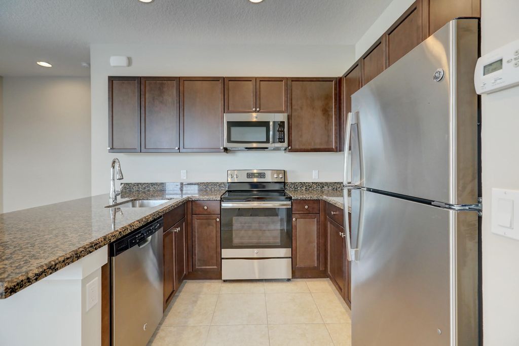 Photo of 6044 Curie Place, Palm Beach Gardens, FL 33418 (MLS # B26011754)