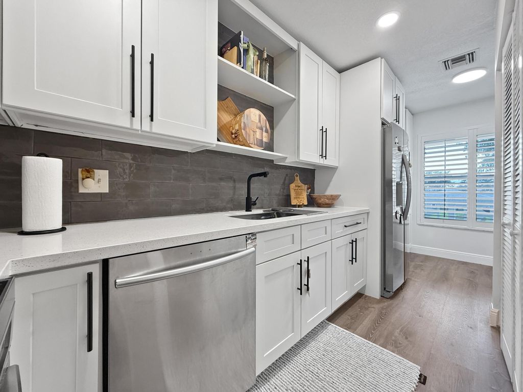 Photo of 1021 Flame Vine Avenue #203, Delray Beach, FL 33445 (MLS # B26010038)