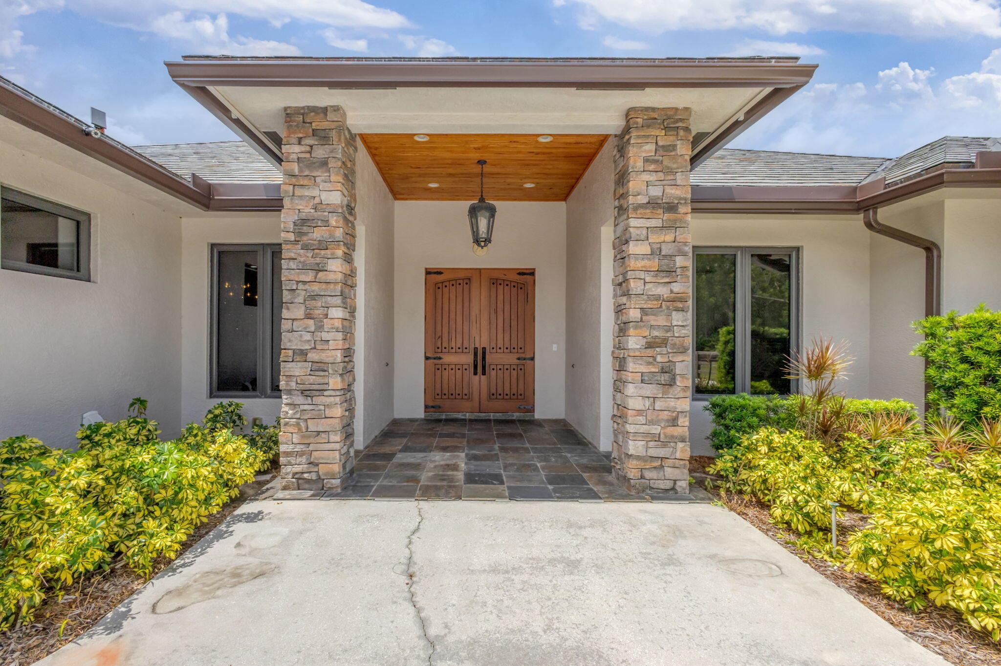 SEE FLOOR PLAN IN DOCUMENTSExceptional 10-Acre Estate with Two Residences. Your privacy begins with the gated entrance to the property framed by two stone columns opening to 10 acres of beautifully manicured open land. The main house, built in 2011, offers 4904 SF of living space. Upon entering you are greeted by a ''pass-thru'' floor to ceiling, stone fireplace that serves both the living room and the family room. This large home features 4 bedrooms and 4 1/2 baths as well as a large gathering/game room with bar seating. The game room is outfitted with a wet bar, wine fridge, sink, making it the ultimate entertainment hub. There is also a very large bonus room adjacent to the Primary bedroom that is ideal for a nursery, home office, yoga room, home gym, etc..
