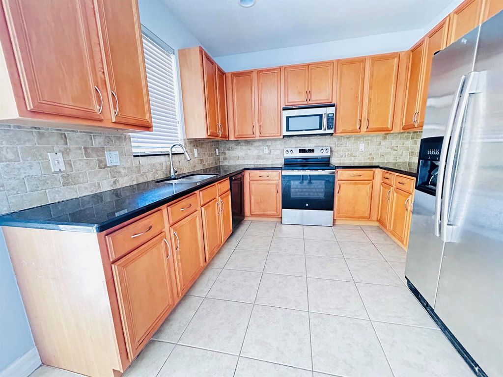 Photo of 119 Ennis Lane, Jupiter, FL 33458 (MLS # R11093294)