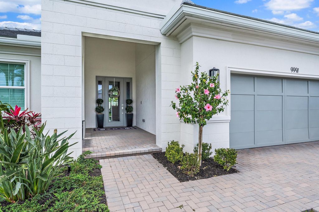 Photo of 9991 Seagrass Way, Palm Beach Gardens, FL 33412 (MLS # R11123480)