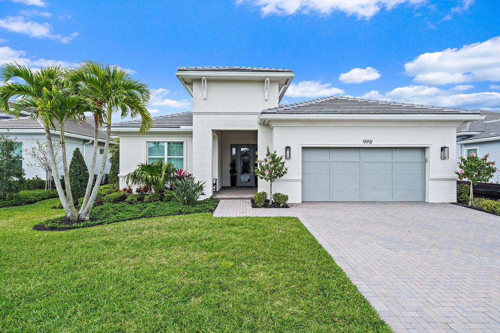 Photo of 9991 Seagrass Way, Palm Beach Gardens, FL 33412 (MLS # R11123480)
