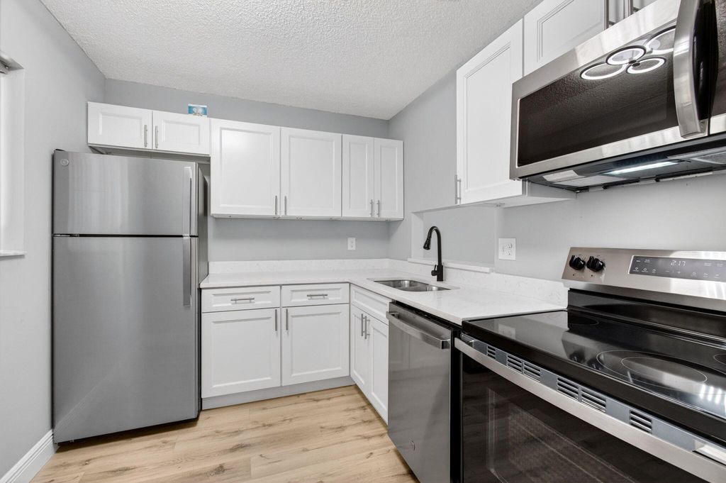 Photo of 5430 Las Verdes Circle, Delray Beach, FL 33484 (MLS # B26018911)