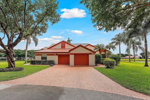 Photo of 7841 Lexington Club Blvd #B, Delray Beach, FL 33446 (MLS # R11159984)