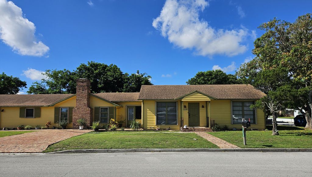 Photo of 1230 N C Street, Lake Worth Beach, FL 33460 (MLS # R10977780)