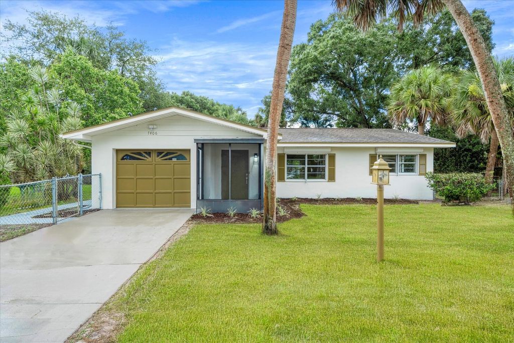 Photo of 7406 Pacific Avenue, Fort Pierce, FL 34951 (MLS # R11001450)