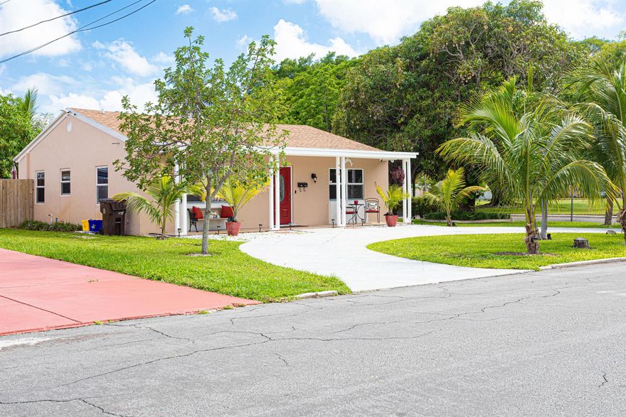 Discover the ideal choice for your dream vacation home in the captivating South Florida region with this exquisite 2-bedroom, 1-bathroom residence. Updated kitchen, a chefs dream with a kitchen island.  Immerse yourself in the sheer delight of a modern roof, expertly installed in 2020, and relish the refreshing comfort provided by a brand-new air conditioning system implemented in 2018. This inviting abode boasts the added advantage of impact windows and shutters, ensuring your safety and tranquility. Located near the vibrant heart of Downtown Palm Beach, and just moments away from the sun-kissed shores, this remarkable property is perfectly positioned for an unforgettable retreat. Great for use as airbnb.